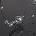 Tinted glass balls on a necklace with magnetic clasp