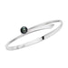 A silver swing bracelet with a black pearl adornment, displaying a classic and contemporary design.