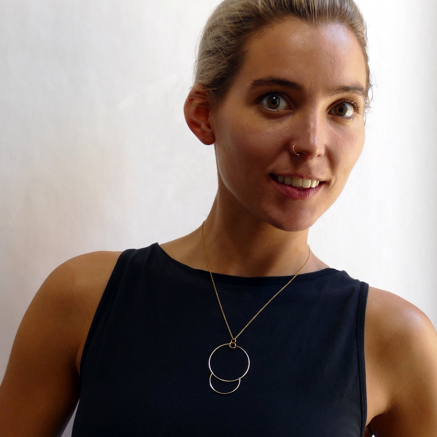 This two-piece elegant sterling silver pendant and chain includes a three inch extender