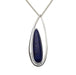 A sterling silver pendant with a lapis stone set inside an open pear-shaped design, attached to a 1mm snake chain.